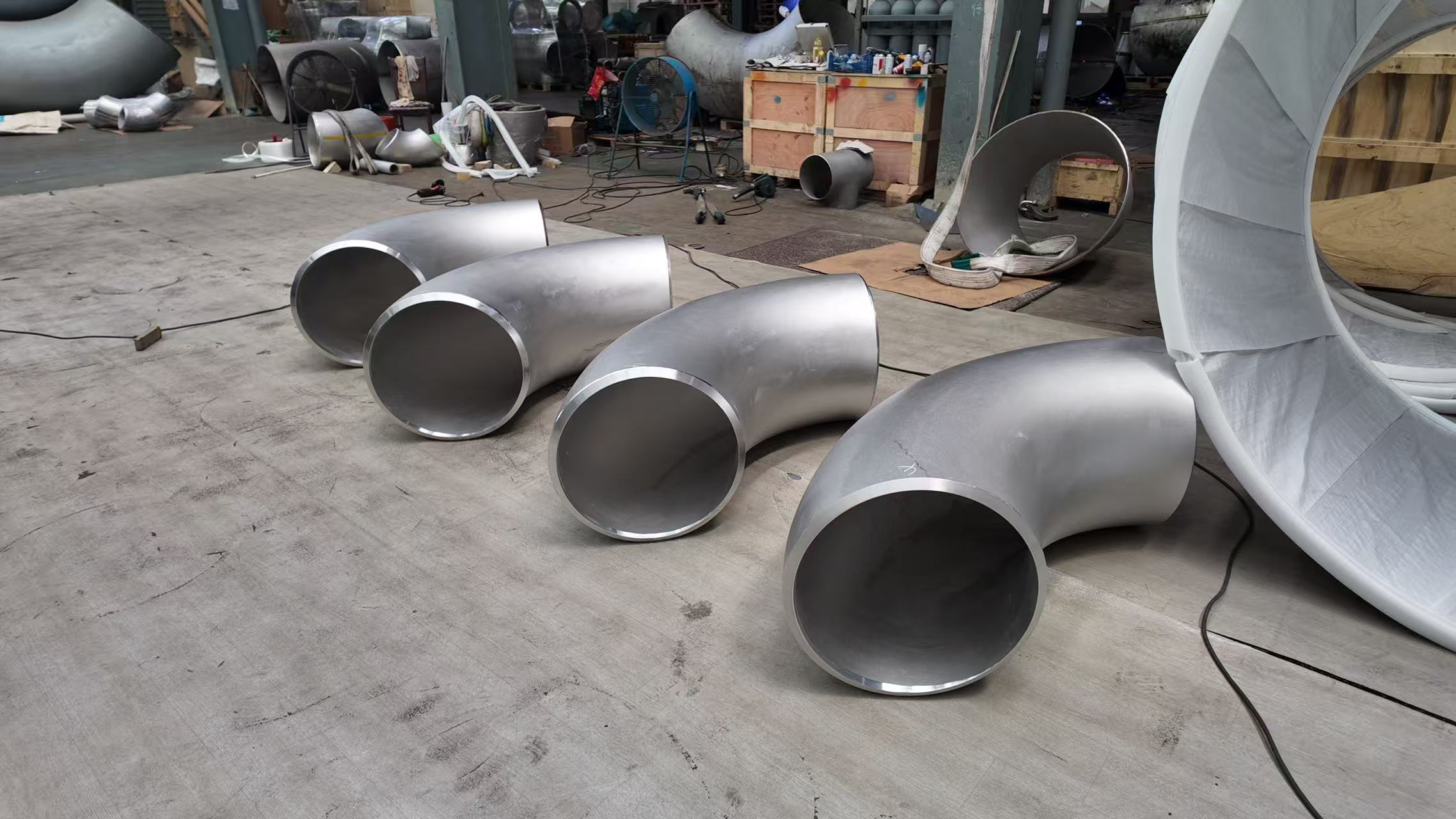 Bakit Tinutukoy ng Mga Inhinyero ang Mga Huwad na Fitting Higit sa Mga Alternatibo ng Cast para sa Mga Kritikal na Piping System?